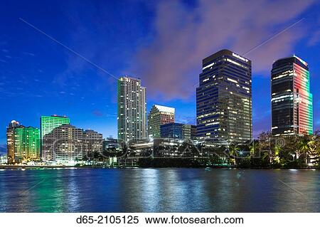 USA, Florida, Miami, city skyline from Brickell Key, evening. View Large Photo Image Stock Photography - USA, Florida, Miami, city skyline from Brickell Key, evening.. Fotosearch