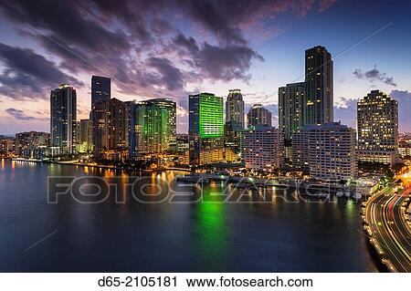 USA, Florida, Miami, elevated city skyline from Brickell Key, evening. View Large Photo Image Stock Image - USA, Florida, Miami, elevated city skyline from Brickell Key, evening.. Fotosearch