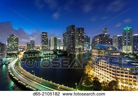 USA, Florida, Miami, elevated city skyline from Brickell Key, evening. View Large Photo Image Stock Image - USA, Florida, Miami, elevated city skyline from Brickell Key, evening.. Fotosearch