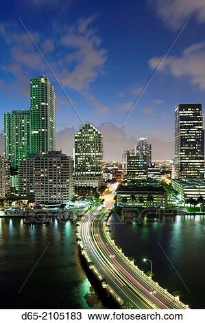 USA, Florida, Miami, elevated city skyline from Brickell Key, evening. View Large Photo Image Stock Image - USA, Florida, Miami, elevated city skyline from Brickell Key, evening.. Fotosearch