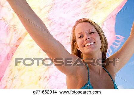 Usa. Florida. Miami. Key Biscayne. Woman on the beach of Crandon Beach. View Large Photo Image Picture - Usa. Florida. Miami. Key Biscayne. Woman on the beach of Crandon Beach.. Fotosearch
