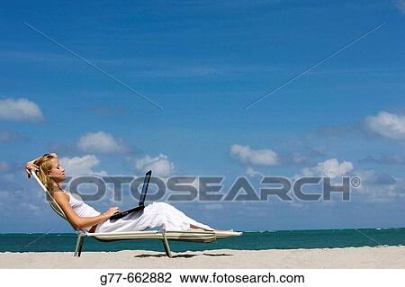 Usa. Florida. Miami. Key Biscayne. Woman on the beach of Crandon Beach. View Large Photo Image Stock Image - Usa. Florida. Miami. Key Biscayne. Woman on the beach of Crandon Beach.. Fotosearch