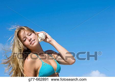 Usa. Florida. Miami. Key Biscayne. Woman on the beach of Crandon Beach. View Large Photo Image Stock Image - Usa. Florida. Miami. Key Biscayne. Woman on the beach of Crandon Beach.. Fotosearch