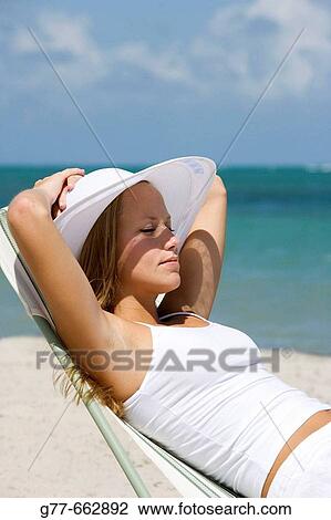 Usa. Florida. Miami. Key Biscayne. Woman on the beach of Crandon Beach. View Large Photo Image Stock Image - Usa. Florida. Miami. Key Biscayne. Woman on the beach of Crandon Beach.. Fotosearch