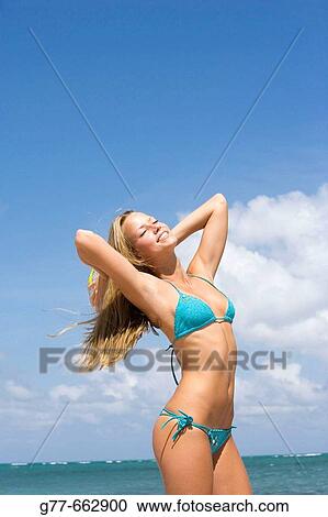 Usa. Florida. Miami. Key Biscayne. Woman on the beach of Crandon Beach. View Large Photo Image Stock Image - Usa. Florida. Miami. Key Biscayne. Woman on the beach of Crandon Beach.. Fotosearch