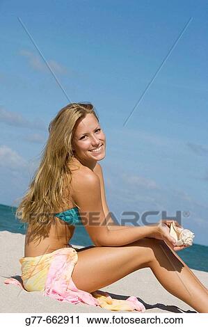 Usa. Florida. Miami. Key Biscayne. Woman on the beach of Crandon Beach. View Large Photo Image Stock Image - Usa. Florida. Miami. Key Biscayne. Woman on the beach of Crandon Beach.. Fotosearch