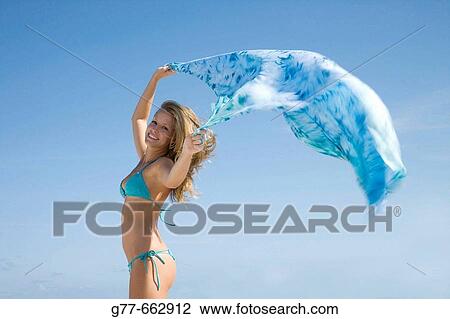 Usa. Florida. Miami. Key Biscayne. Woman on the beach of Crandon Beach. View Large Photo Image Stock Image - Usa. Florida. Miami. Key Biscayne. Woman on the beach of Crandon Beach.. Fotosearch