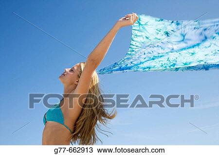 Usa. Florida. Miami. Key Biscayne. Woman on the beach of Crandon Beach. View Large Photo Image Stock Image - Usa. Florida. Miami. Key Biscayne. Woman on the beach of Crandon Beach.. Fotosearch