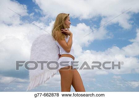 Usa. Florida. Miami. Key Biscayne. Woman on the beach of Crandon Beach. View Large Photo Image Stock Photo - Usa. Florida. Miami. Key Biscayne. Woman on the beach of Crandon Beach.. Fotosearch
