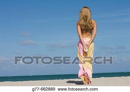 Usa. Florida. Miami. Key Biscayne. Woman on the beach of Crandon Beach. View Large Photo Image Stock Photo - Usa. Florida. Miami. Key Biscayne. Woman on the beach of Crandon Beach.. Fotosearch