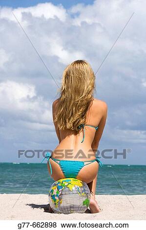 Usa. Florida. Miami. Key Biscayne. Woman on the beach of Crandon Beach. View Large Photo Image Stock Photo - Usa. Florida. Miami. Key Biscayne. Woman on the beach of Crandon Beach.. Fotosearch
