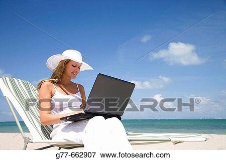 Usa. Florida. Miami. Key Biscayne. Woman on the beach of Crandon Beach. View Large Photo Image Stock Photo - Usa. Florida. Miami. Key Biscayne. Woman on the beach of Crandon Beach.. Fotosearch