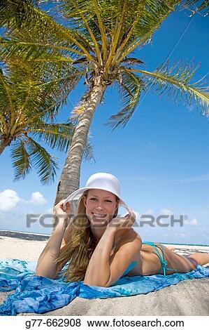 Usa. Florida. Miami. Key Biscayne. Woman on the beach of Crandon Beach. View Large Photo Image Stock Photo - Usa. Florida. Miami. Key Biscayne. Woman on the beach of Crandon Beach.. Fotosearch