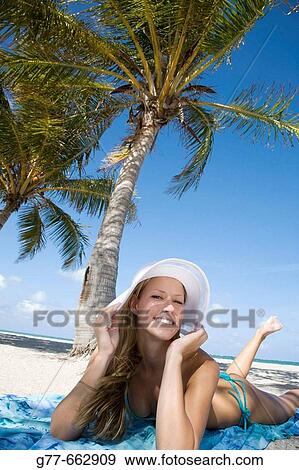 Usa. Florida. Miami. Key Biscayne. Woman on the beach of Crandon Beach. View Large Photo Image Stock Photo - Usa. Florida. Miami. Key Biscayne. Woman on the beach of Crandon Beach.. Fotosearch