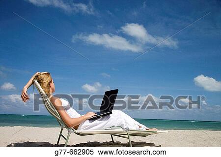 Usa. Florida. Miami. Key Biscayne. Woman on the beach of Crandon Beach. View Large Photo Image Stock Photography - Usa. Florida. Miami. Key Biscayne. Woman on the beach of Crandon Beach.. Fotosearch