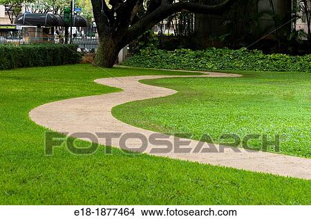 USA, Hawaii, Oahu, Honolulu Concrete sidewalk curving through the lawn in public park View Large Photo Image Picture - USA, Hawaii, Oahu, Honolulu Concrete sidewalk curving through the lawn in public park. Fotosearch