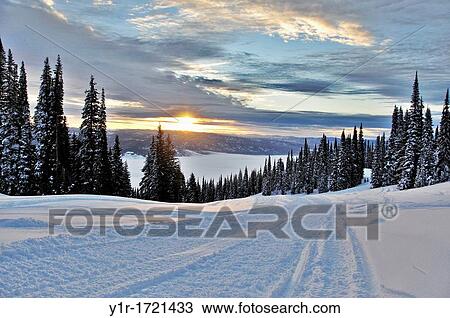 USA, Idaho, Valley County, Sunrise from the Slopes of the West Mountains overlooking the fog covered Long Valley View Large Photo Image Stock Image - USA, Idaho, Valley County, Sunrise from the Slopes of the West Mountains overlooking the fog covered Long Valley. Fotosearch