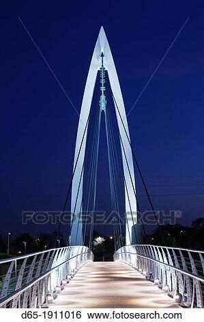 USA, Kansas, Wichita, Keeper of the Plains footbridge on the Arkansas River, dusk View Large Photo Image Stock Photograph - USA, Kansas, Wichita, Keeper of the Plains footbridge on the Arkansas River, dusk. Fotosearch