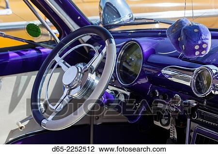 Stock Image - USA, Massachusetts, Gloucester, Antique Car Show, fuzzy dice.. Fotosearch
