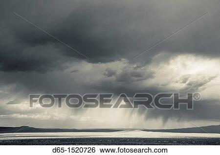 Stock Photograph - USA, Nevada, Great Basin, Beatty, desert storm off Rt 95. Fotosearch