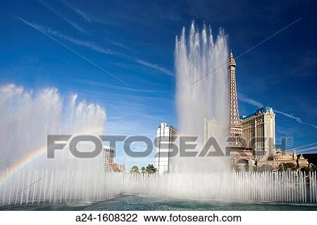 Stock Image - USA-Nevada-Las Vegas City-Bellagio Fountains-Paris Hotel-Rainbow. Fotosearch