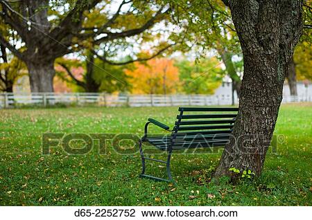 Stock Image - USA, New Hampshire, Canterbury, Canterbury Shaker Village, former Shaker religious community, Meeting House Lane, autumn.. Fotosearch