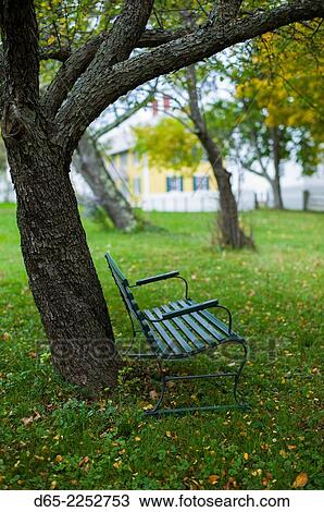 Stock Image - USA, New Hampshire, Canterbury, Canterbury Shaker Village, former Shaker religious community, Meeting House Lane, autumn.. Fotosearch