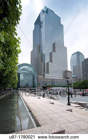 Stock Image - USA, New York City, Manhattan, the Winter Garden Pavillon of the World Financial Center, Fountain. Fotosearch