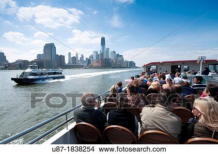 USA, New York, Tourists on Circle Line Tour Boat, Manhattan Skyline View Large Photo Image Picture - USA, New York, Tourists on Circle Line Tour Boat, Manhattan Skyline. Fotosearch