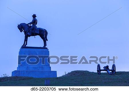 Stock Photography - USA, Pennsylvania, Gettysburg, Battle of Gettysburg, monument to Major General Oliver Howard, dawn.. Fotosearch