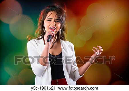 USA, Texas, Female Hispanic girl (16-17) singing View Large Photo Image Stock Image - USA, Texas, Female Hispanic girl (16-17) singing. Fotosearch