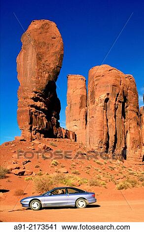 Usa, Utah, Monument Valley, The Thumb rock, car visiting. View Large Photo Image Stock Image - Usa, Utah, Monument Valley, The Thumb rock, car visiting.. Fotosearch