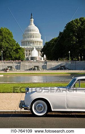 USA, Washington, D. C. A Rolls Royce sits parked in front of the capital building. View Large Photo Image Stock Photo - USA, Washington, D. C. A Rolls Royce sits parked in front of the capital building.. Fotosearch