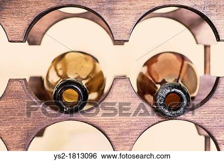 Stock Photograph - Used antique glass bottles used for traditional ale. Fotosearch