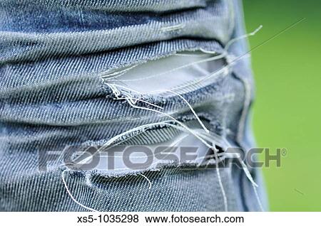 Stock Photo - used jeans. Fotosearch