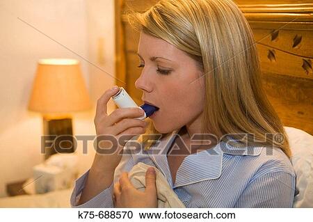 Using bronchial inhaler in bed View Large Photo Image Stock Image - Using bronchial inhaler in bed. Fotosearch