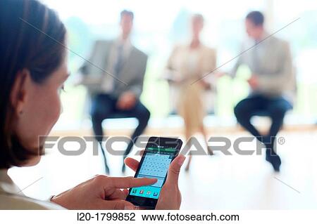 Using smartphone View Large Photo Image Stock Image - Using smartphone. Fotosearch