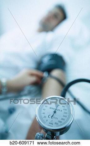 Using sphygmomanometer at hospital View Large Photo Image Stock Image - Using sphygmomanometer at hospital. Fotosearch