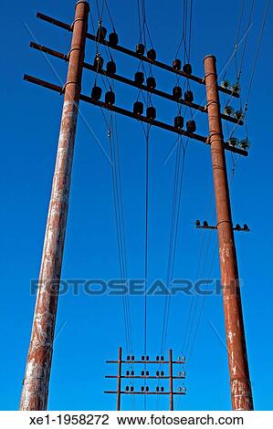 Stock Image - utility poles, Vilanova i la Geltru, Catalonia, Spain.. Fotosearch