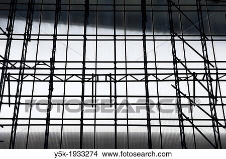 Picture - Utrecht, Netherlands. Scaffolding against an outside wall, during the renovation of Utrecht Central Station.. Fotosearch