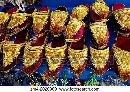 UZBEKISTAN, BUKHARA, BAZAAR SCENE WITH SOUVENIRS, SLIPPERS. View Large Photo Image Stock Photo - UZBEKISTAN, BUKHARA, BAZAAR SCENE WITH SOUVENIRS, SLIPPERS.. Fotosearch