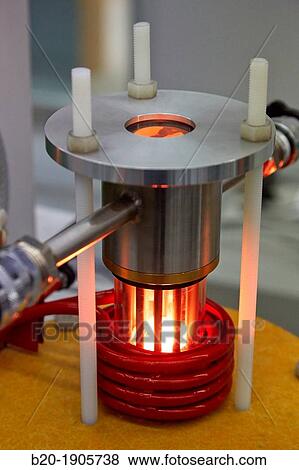Vacuum Levitation Equipment Assisted by an induction furnace, the vacuum levitation equipment 100-1000 g comprises a crucible, coil and mould manufactured in Cu and refrigerated by water View Large Photo Image Stock Photo - Vacuum Levitation Equipment Assisted by an induction furnace, the vacuum levitation equipment 100-1000 g comprises a crucible, coil and mould manufactured in Cu and refrigerated by water. Fotosearch