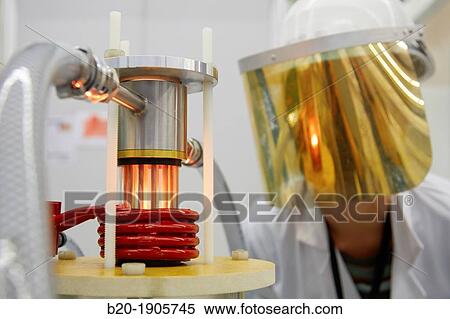 Vacuum Levitation Equipment Assisted by an induction furnace, the vacuum levitation equipment 100-1000 g comprises a crucible, coil and mould manufactured in Cu and refrigerated by water View Large Photo Image Stock Photography - Vacuum Levitation Equipment Assisted by an induction furnace, the vacuum levitation equipment 100-1000 g comprises a crucible, coil and mould manufactured in Cu and refrigerated by water. Fotosearch