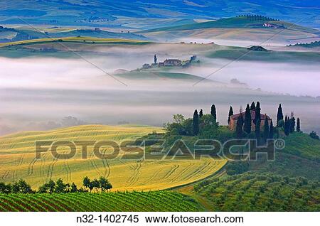 Val d? Orcia Orcia Valley Morning fog The Belvedere at dawn UNESCO World Heritage Site San Quirico d? Orcia Siena Province Tuscany Tuscany landscape Italy Europe. View Large Photo Image Stock Photography - Val d? Orcia Orcia Valley Morning fog The Belvedere at dawn UNESCO World Heritage Site San Quirico d? Orcia Siena Province Tuscany Tuscany landscape Italy Europe.. Fotosearch