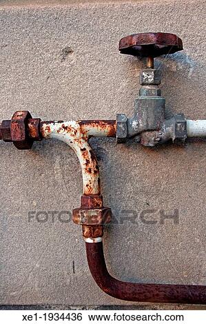 Stock Photograph - valves and pipes, Fabra and Coats old factory, Barcelona, Catalonia, Spain.. Fotosearch