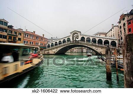 Stock Image - Vaporetto in Ponte Rialto, Venice, Italy. Fotosearch