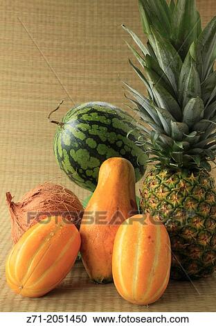 Variety of fruit display, coconut, watermelon, pineapple, papaya, korean melon,. View Large Photo Image Stock Image - Variety of fruit display, coconut, watermelon, pineapple, papaya, korean melon,.. Fotosearch