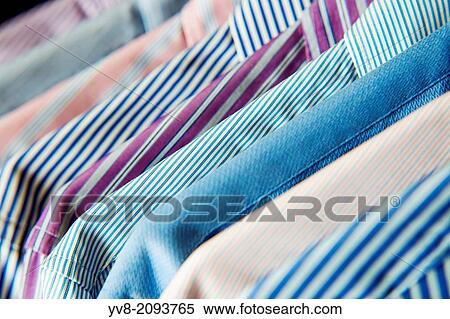 various hanging men's shirts. View Large Photo Image Stock Photography - various hanging men's shirts.. Fotosearch