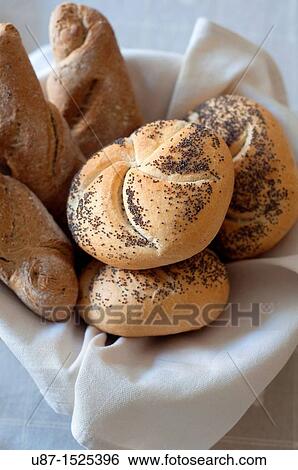 Stock Photograph - Various Types of Bread with Poppy Seeds. Fotosearch