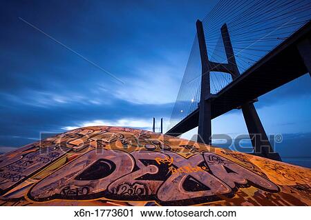 Vasco da Gama bridge and graffiti park Lisbon, Portugal View Large Photo Image Stock Image - Vasco da Gama bridge and graffiti park Lisbon, Portugal. Fotosearch